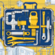 A toolbox filled with various plumbing tools next to a blueprint of a residential building